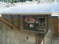 A solar panel was added to the system by a group after Ecofficiency had installed the system. The solar panel charged a battery, which ran the pump. The panel and battery could not provide the system with a reliable enough energy supply to keep it functioning without additional power.