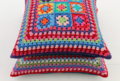 Put some granny squares together, with or without a fabric piece, for a neat cushion