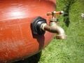 The spigot is installed on the rainwater storage tank