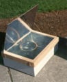 Solar Box Cooker: Glass panel creates greenhouse effect
